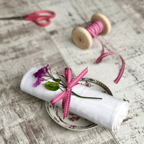 Pink stitched narrow ribbon